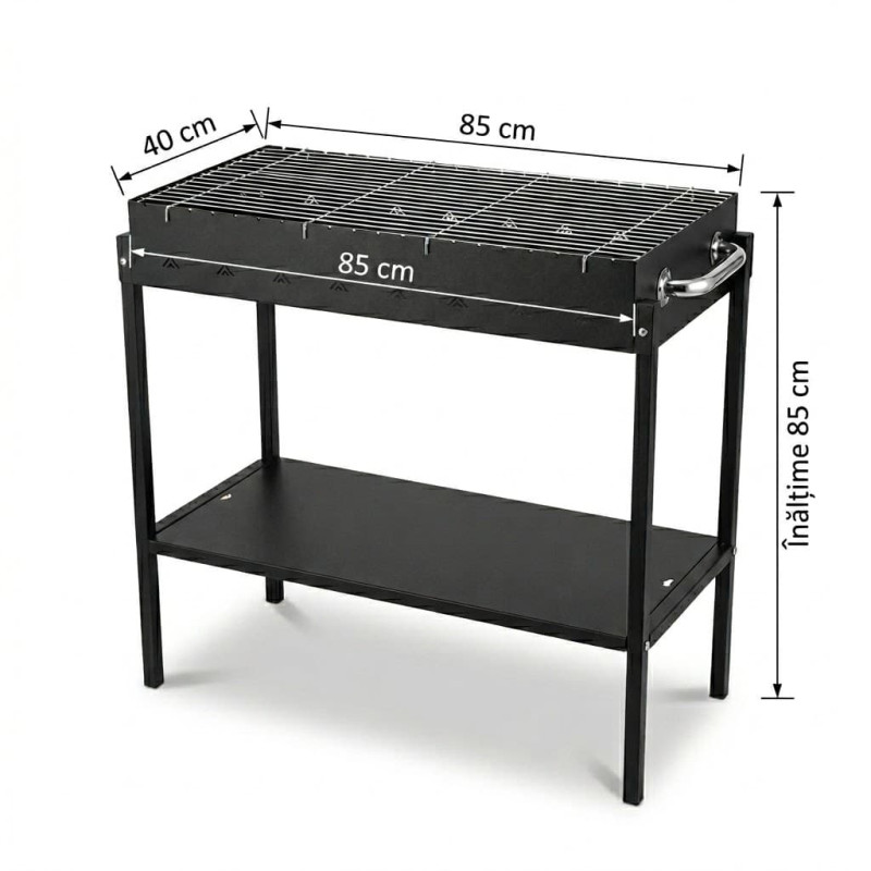 Grătar portabil negru pentru picnic, cu cărbuni, asamblat pe iarbă verde